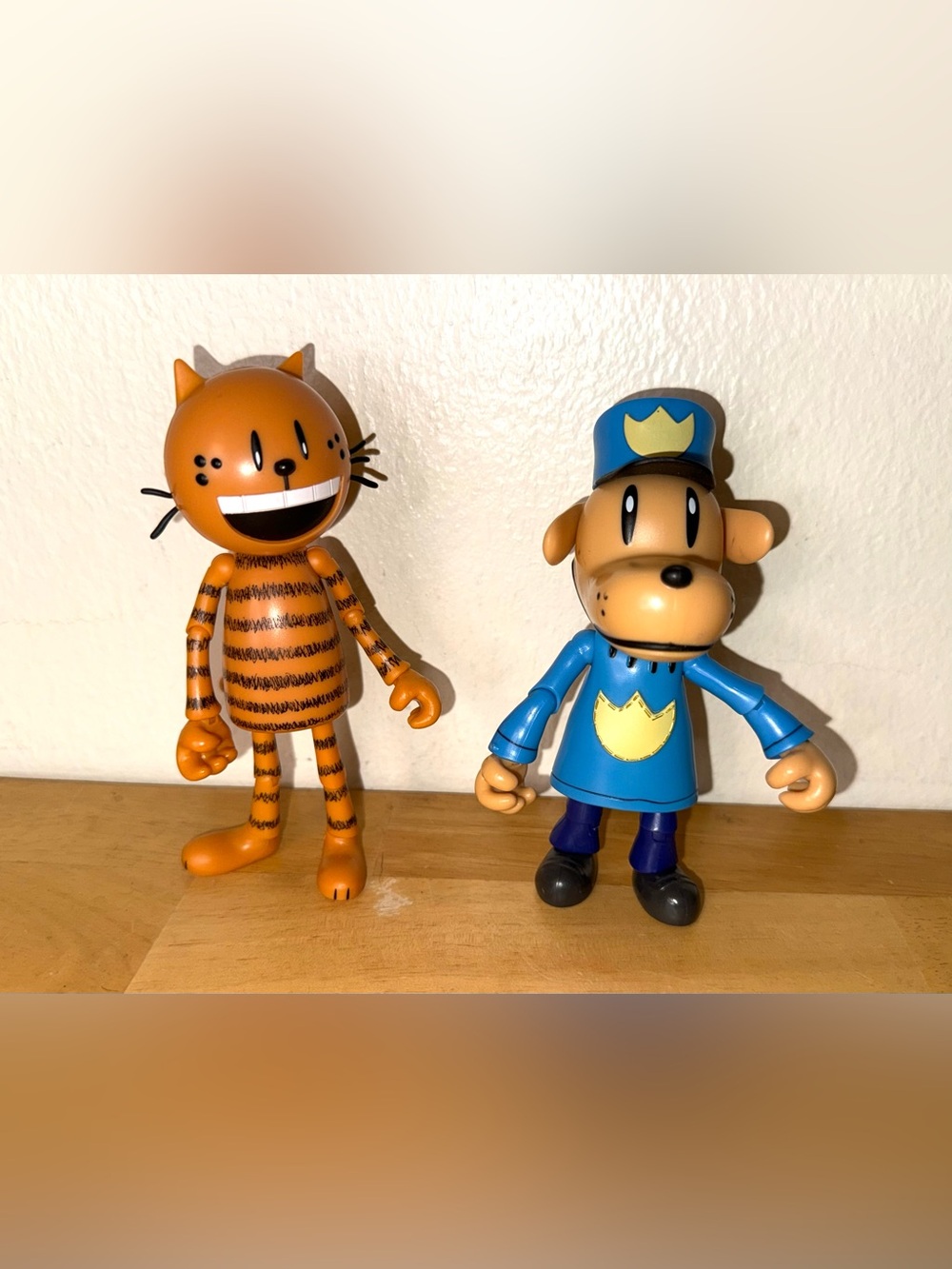 Petey the Cat and Dog Man articulated figures from the Dog Man graphic novels